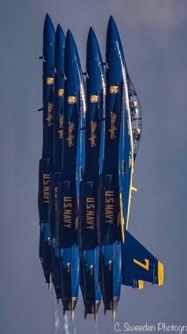 Five American jets from The Navy's famed Blue Angels flying vertical