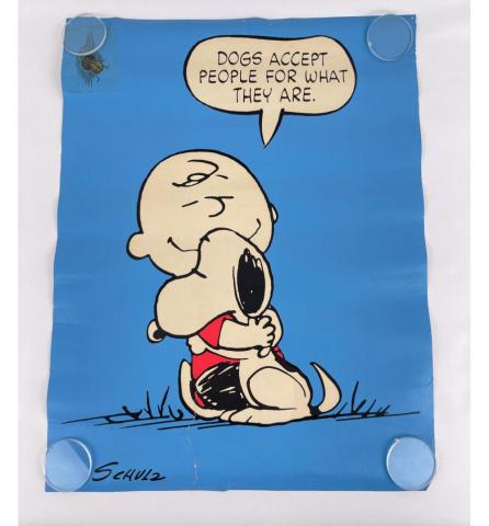 Peanuts cartoon with label "Dogs Accept People for What They Are"